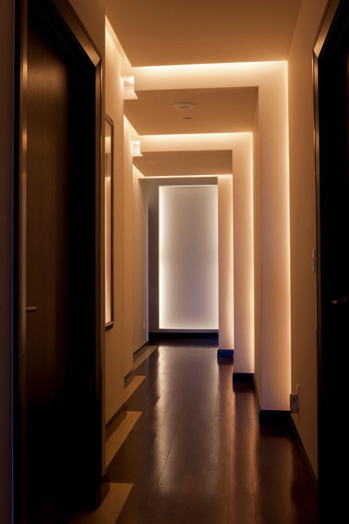 Custom backlight penthouse hallway